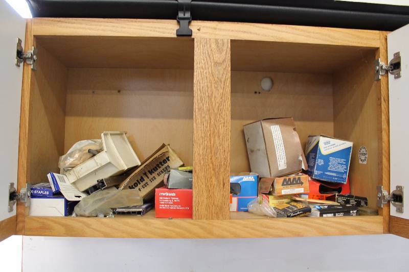 lot 134 image: Cabinet of Tools, Nails, Screws, Staples, Mity Vac w Manual