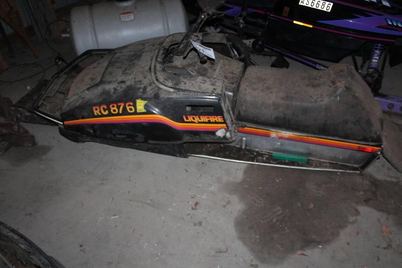 lot 194 image: 1980s John Deere Liquifire Snowmobile