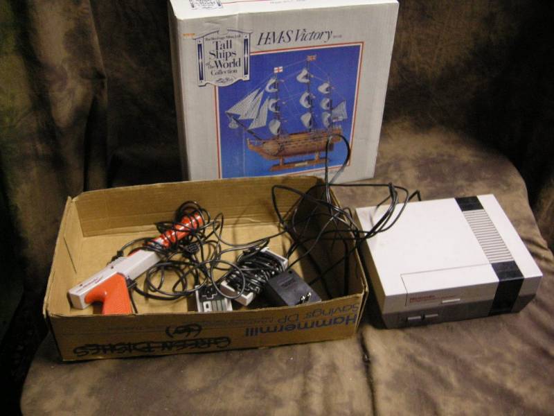 lot 43 image: Vintage NES Nintendo Video Game and a Ship