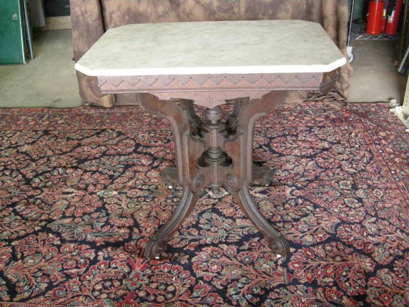 lot 1 image: Carved Mahogany Marble Top Parlor Table