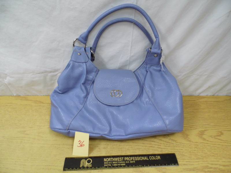 lot 36 image: Light Purple Purse