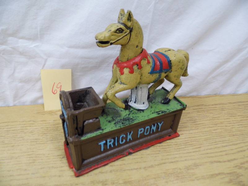 lot 69 image: Trick Pony Cast Iron Bank