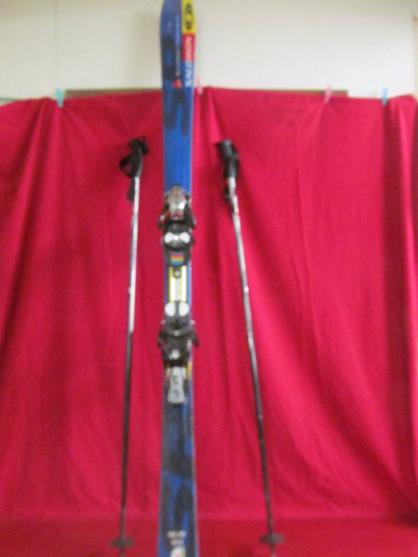 lot 22 image: skis, poles, boots