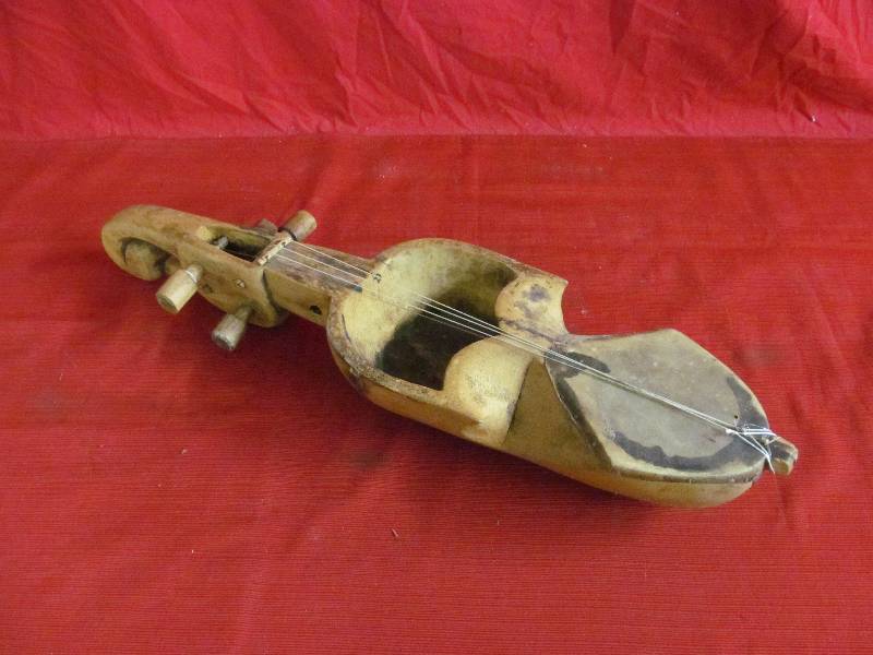 lot 110 image: vintage homemade musical instrument