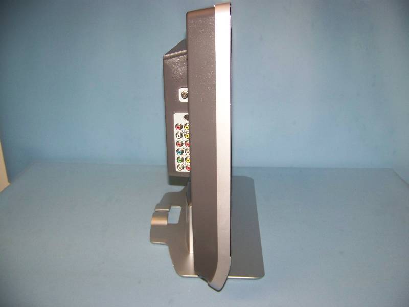 lot 13 image: 23, Philips, LCD, Widescreen, HDTV on Stand with Remote Control in Original Box