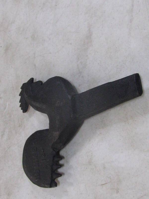 lot 17 image: Cast Iron Chicken Windmill Weight