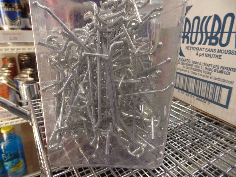Plastic Tub of 4 Retail Peg Board Pegs