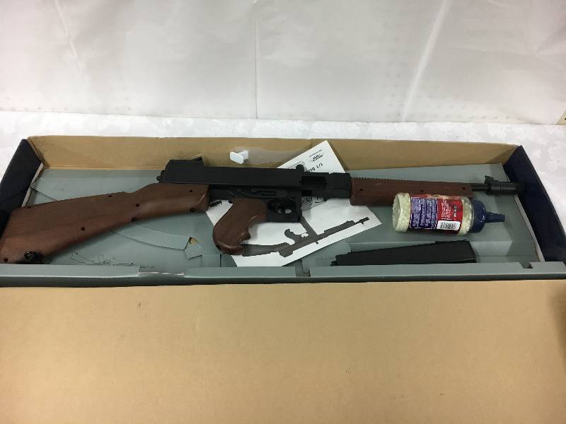 lot 51 image: Thompson Softair BB Gun