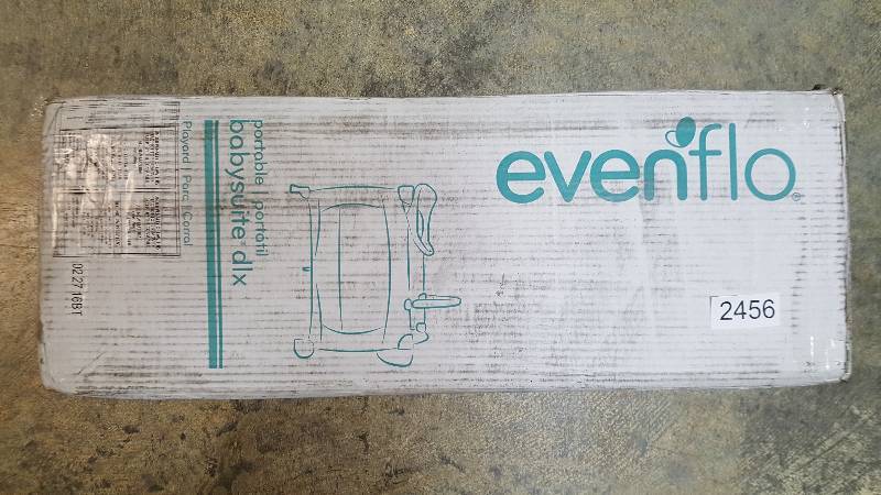 lot 2456 image: Evenflo Portable BabySuite Deluxe Play Yard - Blue