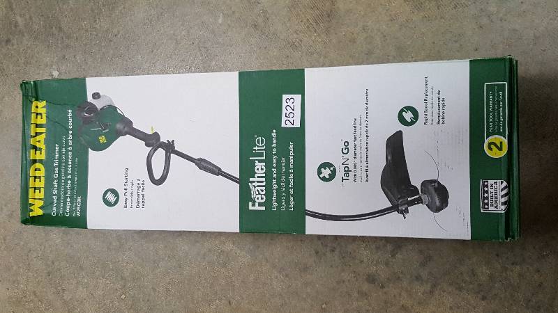 lot 2523 image: Weed Eater 16 Curved Shaft 2-Cycle Gas-Powered Grass Trimmer