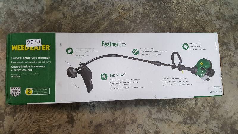 lot 2670 image: Weed Eater 16 Curved Shaft 2-Cycle Gas-Powered Grass Trimmer