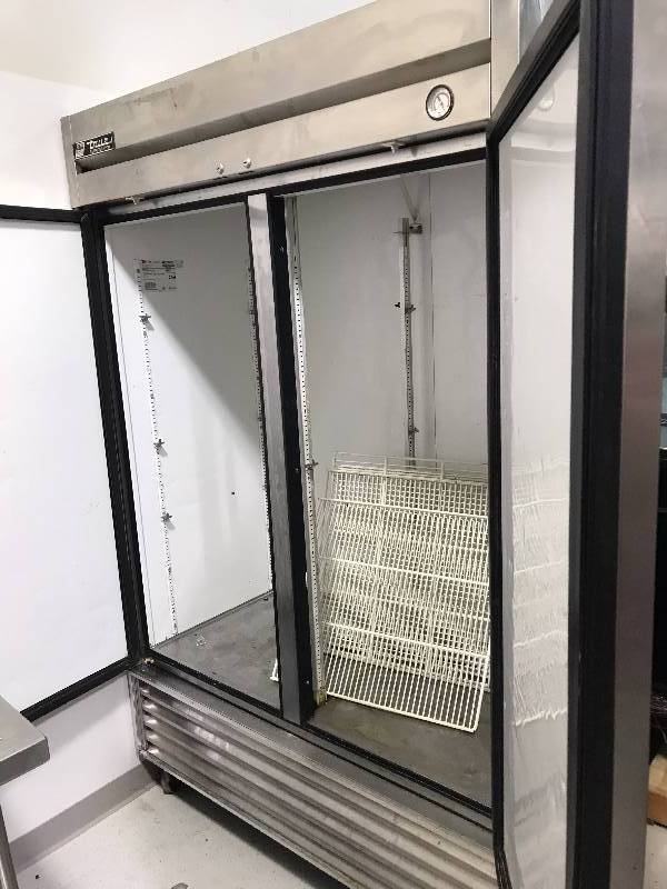 True, Mod #T-49, two door Stainless refrigerator, caster mounted, NSF, 115 voltz  Runs Cools