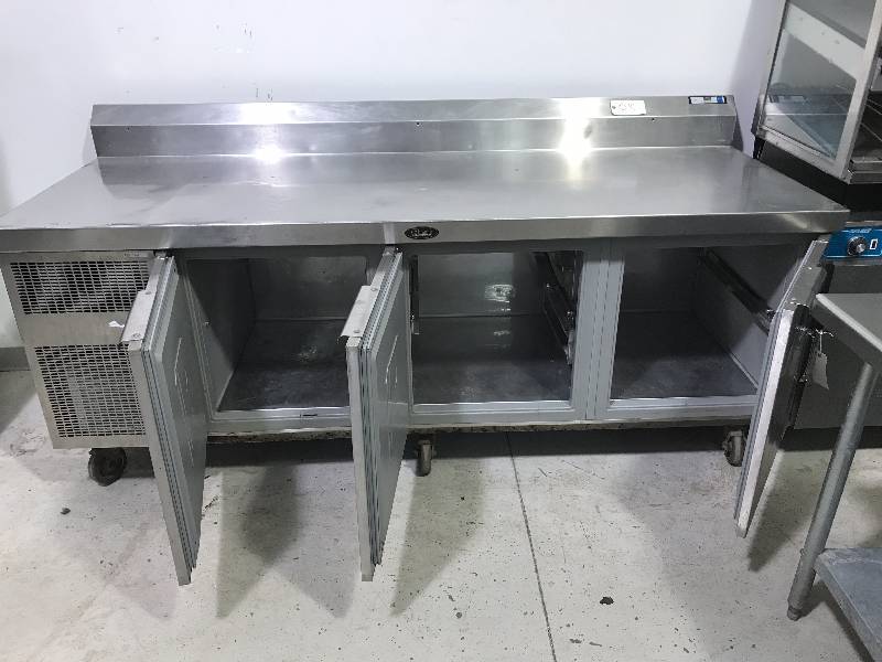 Randell, 3 door work top refrigerator, NSF, caster mounted, 115 volts, 88x33x35H w7 back splash. RunsCools