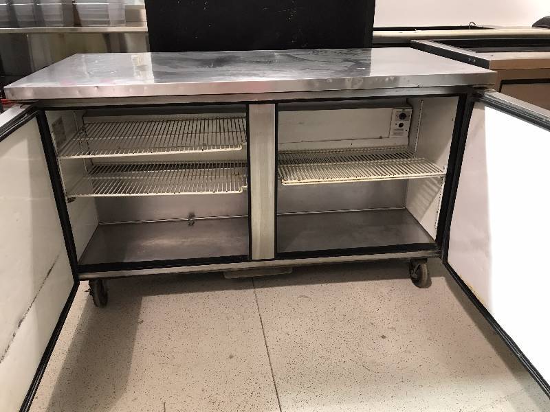 True, Mod #TUC-60F, two door under counter freezer, NSF, SN 1-4275511, caster mounted, 115 volts, 10.9 amps,Runs Freezes
