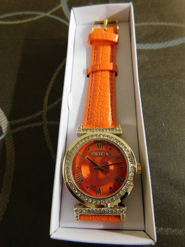 GENEVE WOMENS WATCH WITH ORANGE WRIST BAND