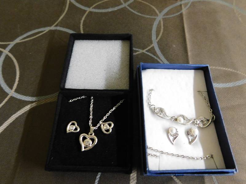TWO JEWELRY SETS