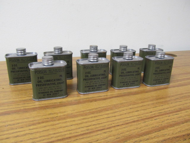 lot 117 image: Lot of 9 Vintage Military Gun Oil Cans