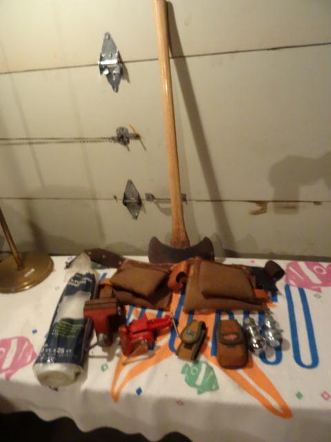 Tool belt. Small bench vise. Axe. C...