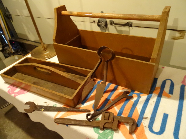 Various vintage tools with tool tot...
