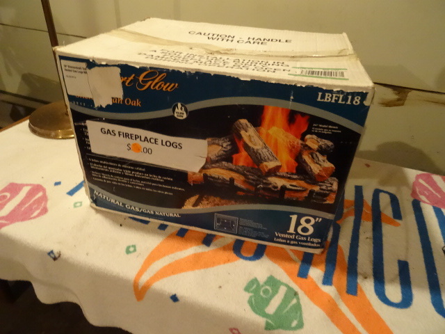 Gas fire place logs. 18 vented log...