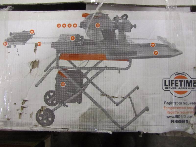 lot 12 image: RIDGID 10 in. Wet Tile Saw with Stand