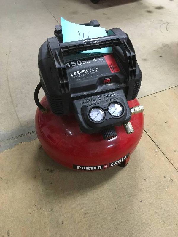 lot 14 image: Porter Cable 6 gal. 150 PIS Portable Air Compressor. in like new conditions