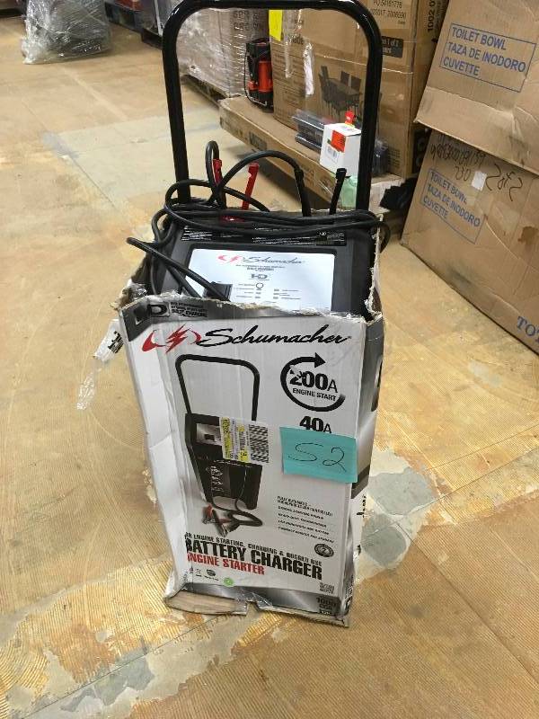 lot 52 image: Schumacher Electric 200-amp Engine Start Wheel Charger. USED