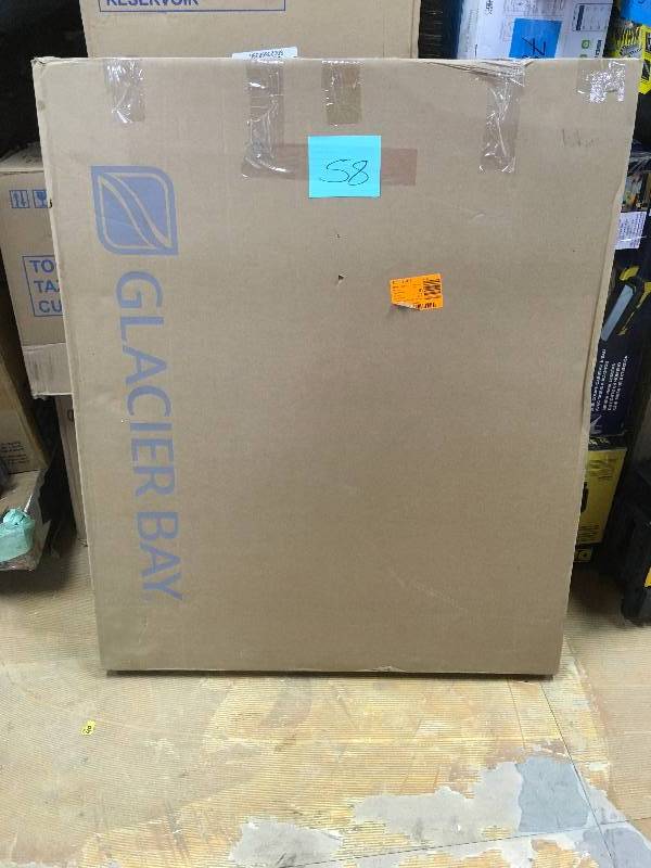 lot 58 image: Glacier Bay Hampton 29-14 in. x 35 in Framed Vanity Mirror in Oak. New Open Box