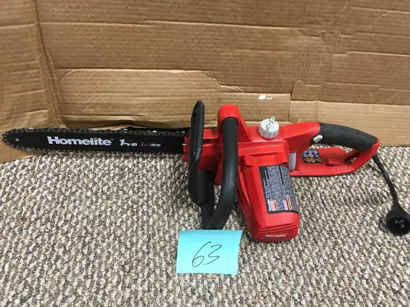 lot 63 image: Homelite 14 in. 9 Amp Electric Chainsaw. in working conditions