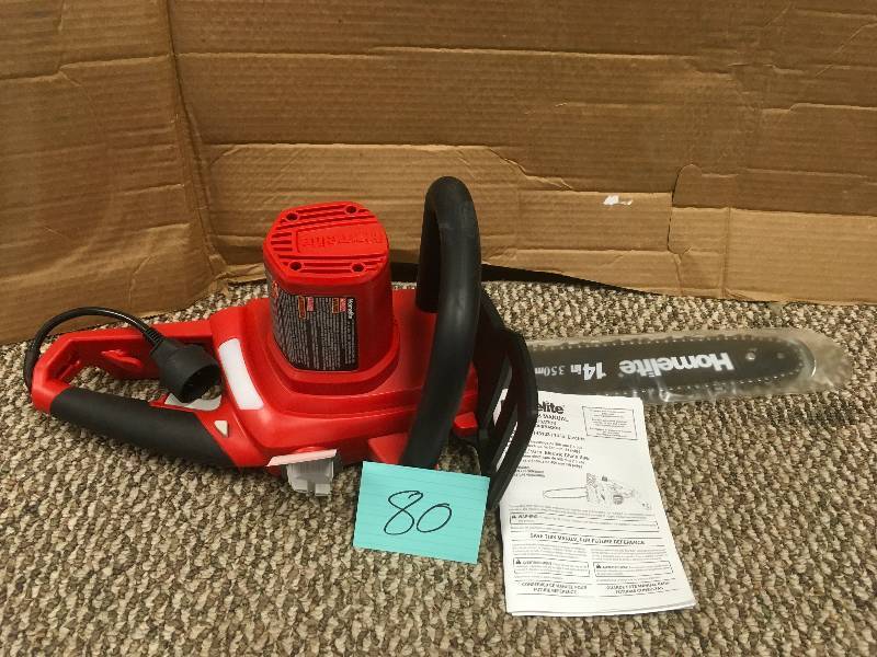 lot 80 image: Homelite 14 in. 9 Amp Electric Chainsaw. in working conditions