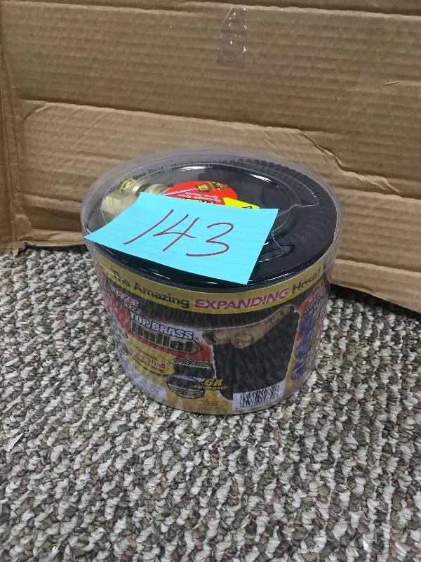 lot 143 image: Pocket Hose - 8703-12 Telebrands 50 Ft Black Pocket Hose. New Open Box