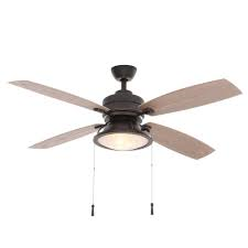 lot 45 image: Hampton Bay Kodiak 52 in. IndoorOutdoor Dark Restoration Bronze Ceiling Fan with Light not used  Open Box