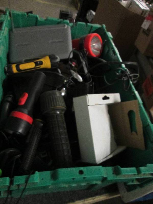 green plastic tote full of electron...