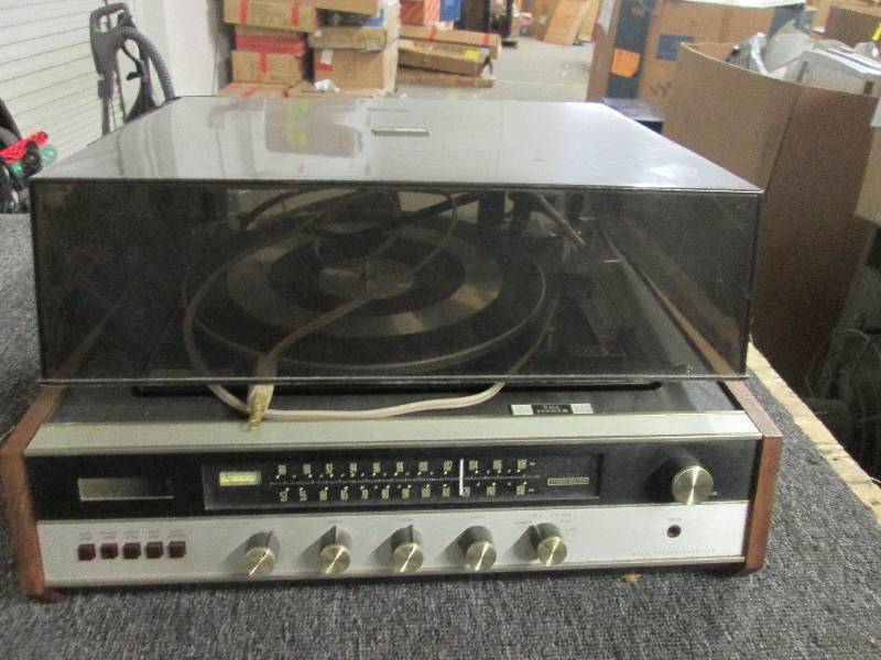 the fisher 125 radio and turn table...