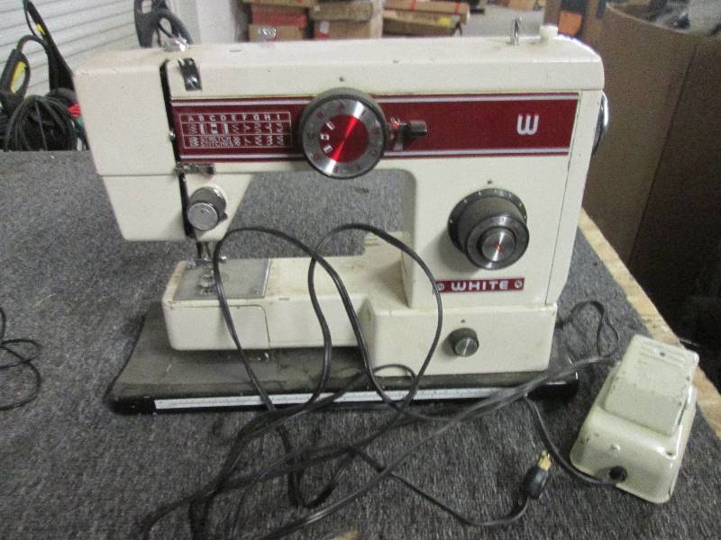 white sewing machine tested and wor...