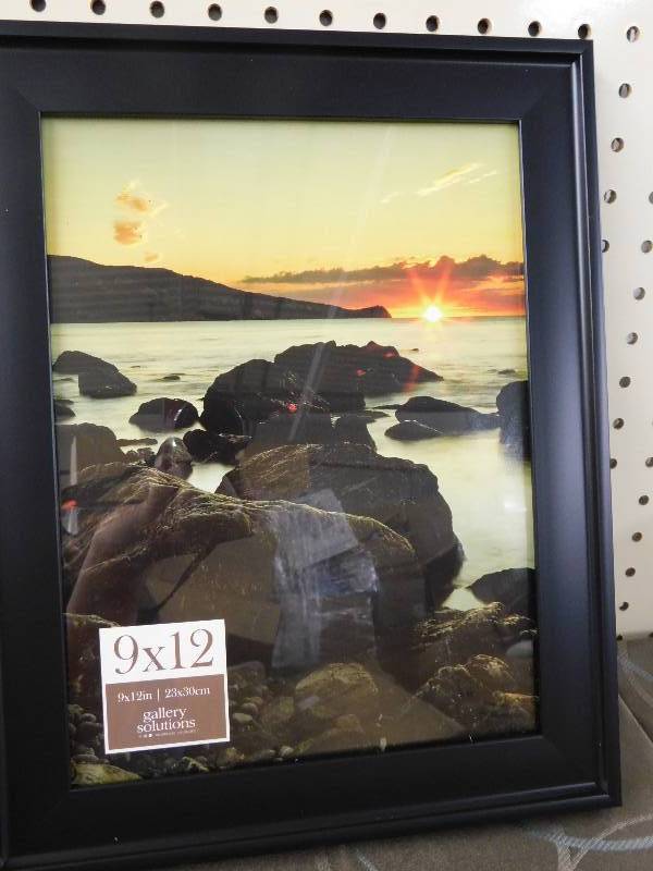 lot 162 image: 9X12 Black Digital Photo Frame, MSRP $19.99