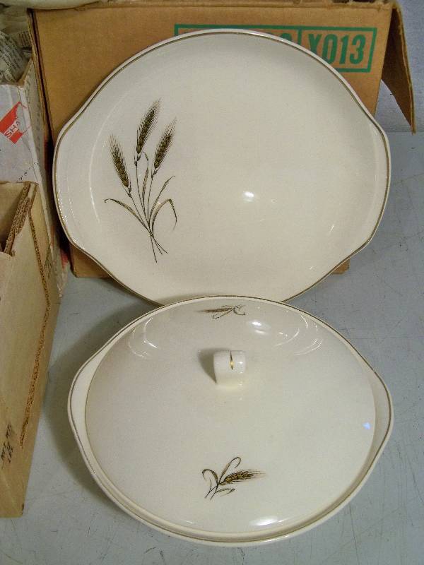 lot 63 image: Wheat Dish Set