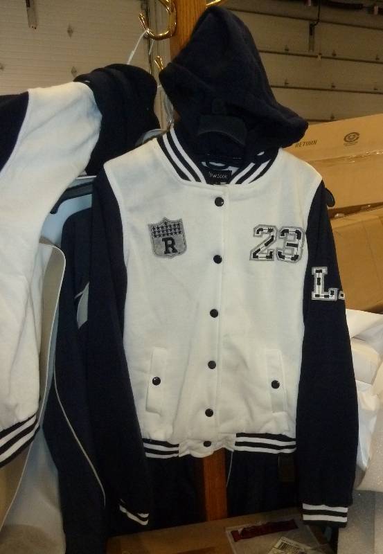 Two blue and white varsity jackets,...