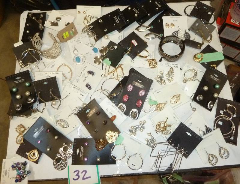 Lot of earrings and bracelets. Lots...