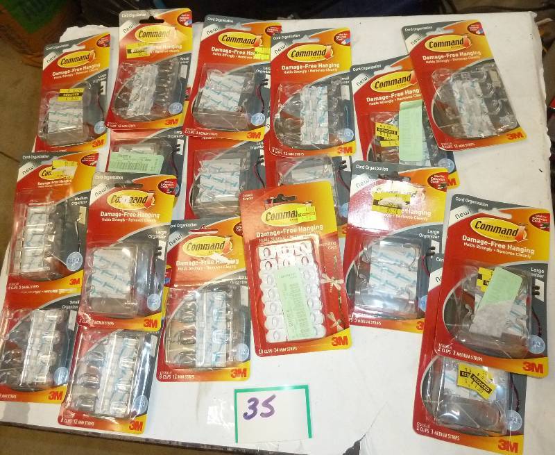 18 packages of Command Strips, Cord...