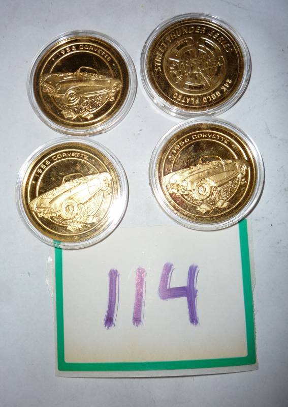 4 gold plated chevy corvette coins...