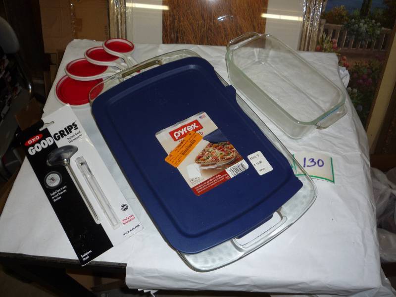 2 pyrex dishes, measuring cup set, ...