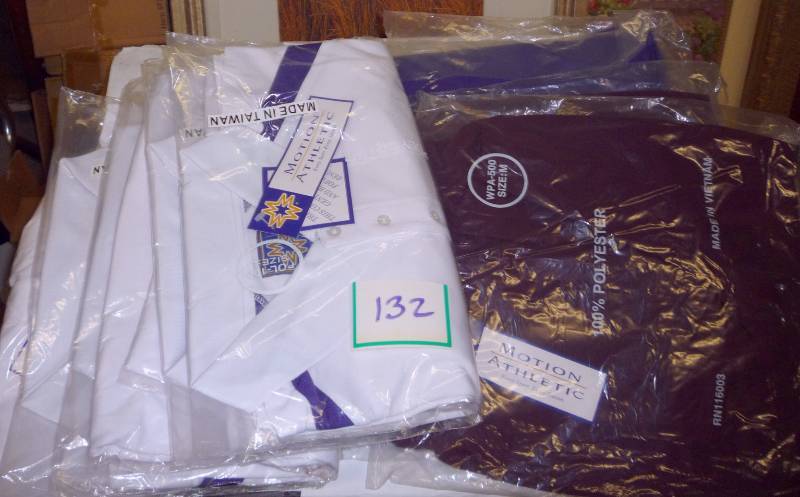 5 large polo shirts with purple str...