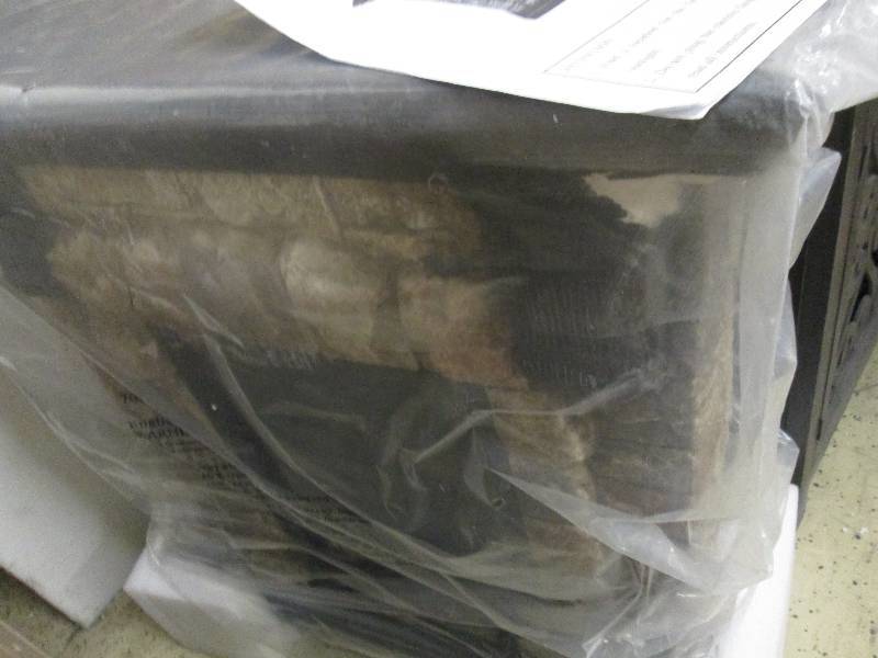 lot 63 image: Faux Stone Fireplace open box, dama...