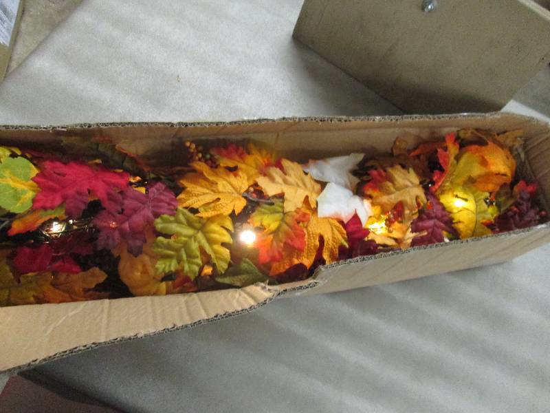 lot 126 image: Pre-Lit Fall Leaves Garland open bo...
