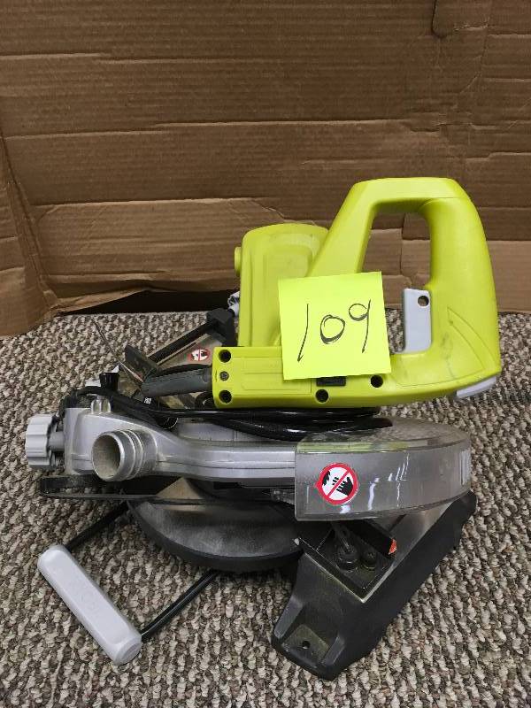 lot 109 image: Ryobi 9 Amp 7-14 in. Compound Miter Saw with Laser - missing bag in like new condition Open Box