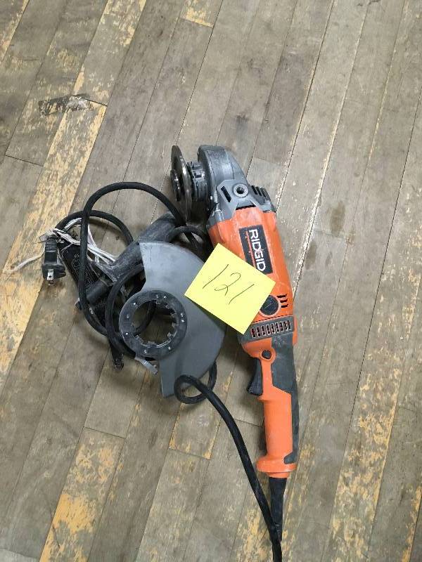lot 121 image: Ridgid 15 Amp Corded 7 in. Twist Handle Angle Grinder - Open Box- used in good working condition