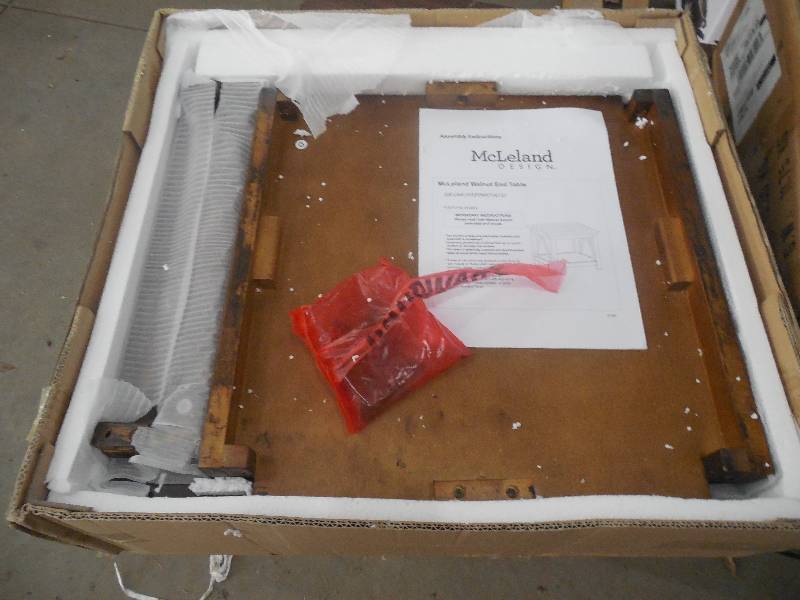 lot 40 image: McLeland Design Walnut-Finished Coffee Table