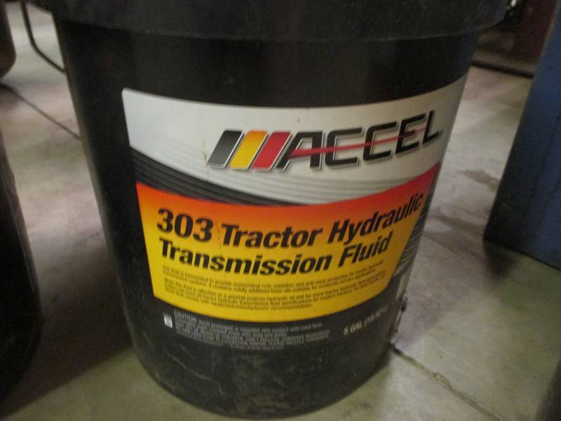 lot 208 image: Hy-Tran Fluid (2) Full 5gal (1) Partial 5 gal