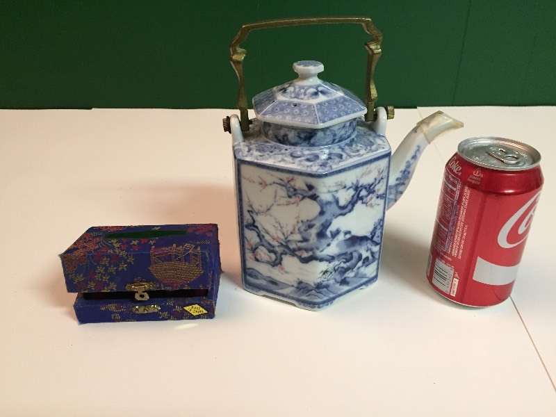lot 41 image: Asian Teapot & Panda Stress Chime Balls